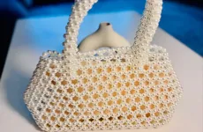 Shine bright with the exquisite Goddess Handmade Beaded Bag
