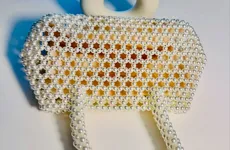 Shine bright with the exquisite Goddess Handmade Beaded Bag