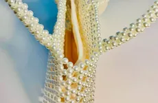 Shine bright with the exquisite Goddess Handmade Beaded Bag